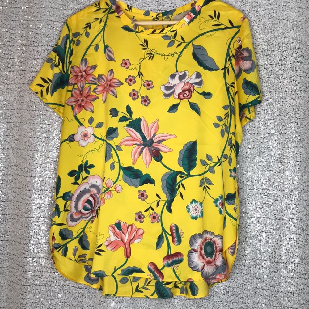Blouse with beautiful floral pattern. Worn twice.